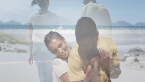 Composite-of-happy-african-american-couple-embracing,-and-walking-on-beach