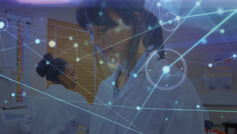 Animation-of-network-of-connections-over-asian-female-lab-worker