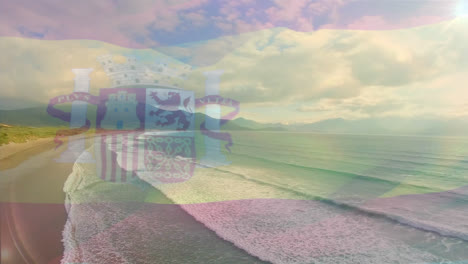 Digitale-Komposition-Aus-Wehender-Spanischer-Flagge-Vor-Der-Luftaufnahme-Des-Strandes