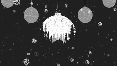 Snowflakes-falling-over-christmas-bauble-decoration-hanging-against-black-background