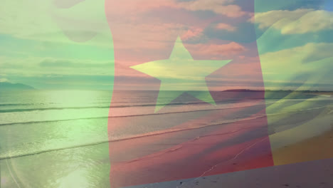 Animation-Der-Flagge-Kameruns,-Die-über-Der-Strandlandschaft-Weht
