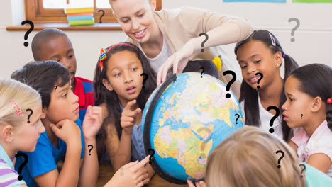 Animation-of-question-marks-over-diverse-elementary-school-teacher-and-class-using-globe