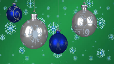 Animation-of-christmas-balls-over-snowflakes-on-green-background