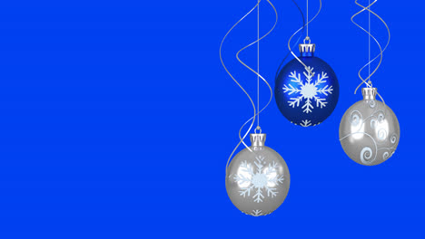 Animation-Von-Weihnachtskugeln-Auf-Blauem-Hintergrund