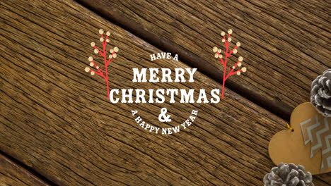 Animation-of-merry-christmas-text-on-wooden-background