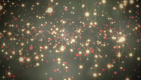 Animation-of-glowing-christmas-spots-falling-on-green-background