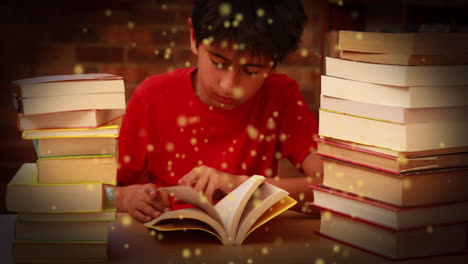 Animation-of-glowing-spots-over-asian-boy-reading-book