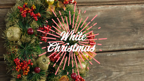 Animation-of-white-christmas-text-over-wreath