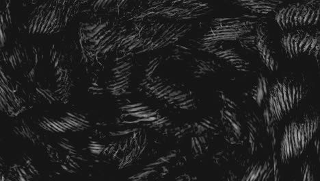 Animation-of-strange-scary-halloween-shapes-on-black-background