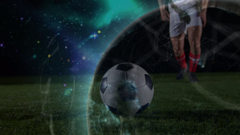 Animation-of-globe-rotating-over-legs-of-caucasian-male-soccer-player