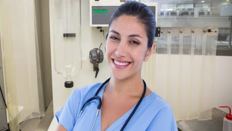 Animation-of-smiling-caucasian-female-doctor-with-stethoscope-over-surgeon-room