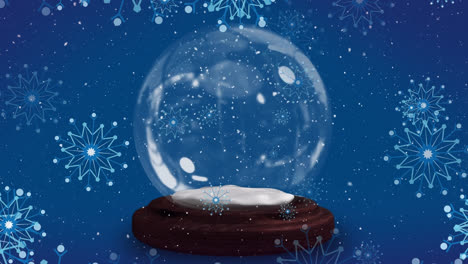 Animation-Von-Weihnachtlichen-Schneeflocken,-Die-über-Eine-Schneekugel-Auf-Blauem-Hintergrund-Fallen