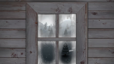 Holzfensterrahmen-Gegen-Schnee,-Der-über-Mehrere-Bäume-In-Der-Winterlandschaft-Fällt