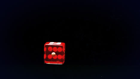 Animation-of-molecules-over-dice-on-dark-back-ground