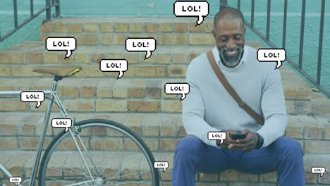 Multiple-speech-with-lol-text-floating-against-african-american-senior-man-using-smartphone