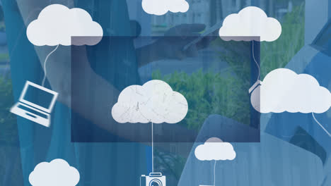 Animation-of-clouds-with-icons-over-caucasian-woman-using-smartphone
