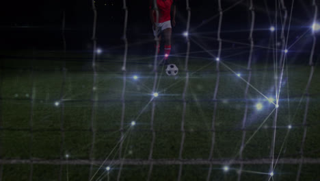Animation-of-network-of-connections-over-african-american-male-soccer-player