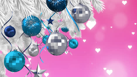 Animation-Von-Kugeln,-Die-Am-Weihnachtsbaum-Auf-Rosa-Hintergrund-Mit-Herzen-Hängen
