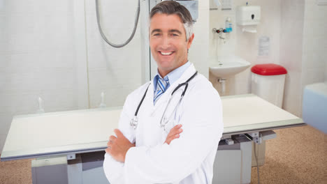 Animation-of-smiling-caucasian-male-doctor-with-stethoscope-over-surgeon-room