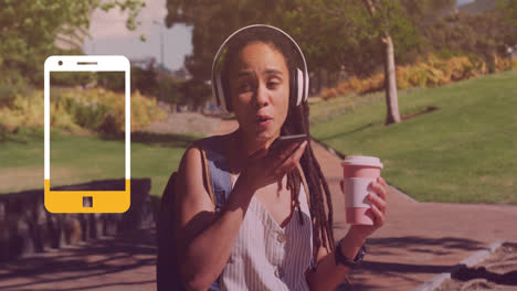 Animation-of-smartphone-icon-over-biracial-woman-talking-on-smartphone-in-park