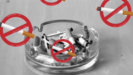 Animation-of-cigarettes-icon-with-prohibition-sign-over-ashtray-on-grey-background