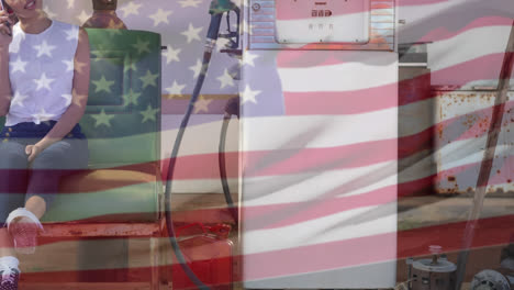 Animation-of-waving-usa-flag-over-woman-at-the-gas-station