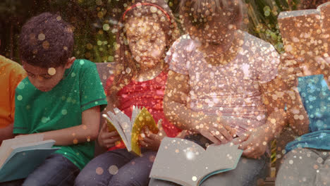 Animation-of-glowing-spots-over-diverse-children-reading-books