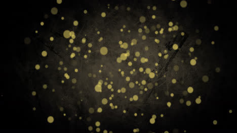 Animation-of-golden-dots-falling-on-black-background