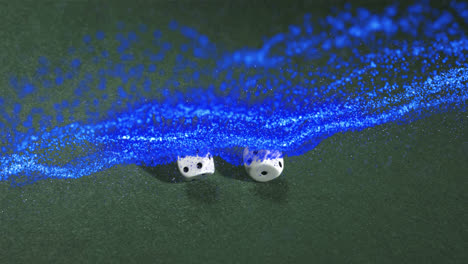 Animation-of-blue-wave-over-dice-on-game-table