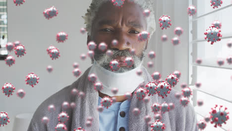 Animation-of-virus-cells-over-senior-african-american-man-with-face-mask