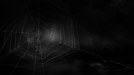 Animation-of-spiders-web-over-stormy,-dark-halloween-sky