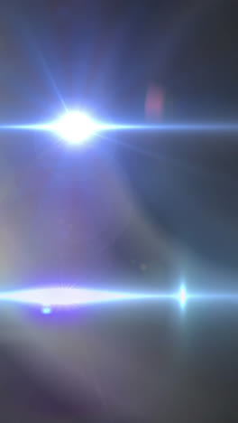 Animation-of-spotlight-with-lens-flare-and-light-beams-moving-over-dark-background