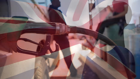 Animation-of-waving-uk-flag-over-people-at-the-gas-station