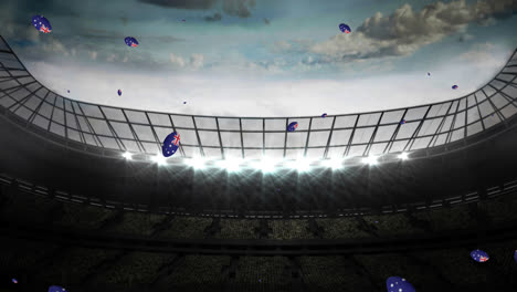 Animation-of-rugby-balls-coloured-with-flag-of-australia-at-stadium