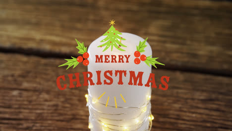 Animation-of-merry-christmas-text-over-christmas-candles