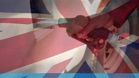 Animation-Einer-Wehenden-Britischen-Flagge-über-Einem-Mann-An-Der-Tankstelle