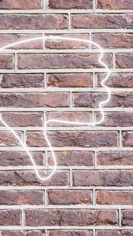 Animation-of-glowing-neon-thumb-down-icon-on-brick-wall