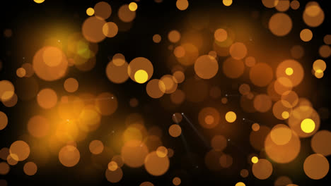 Animation-of-golden-spots-of-light-falling-on-brown-background