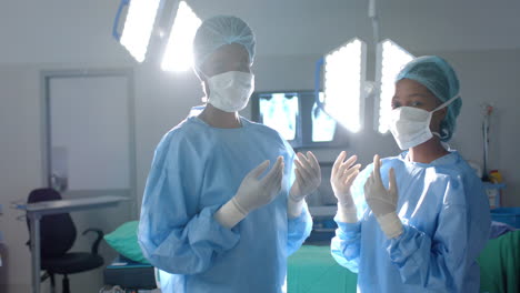 Surgeons-prepare-for-surgery-in-a-bright-operating-room