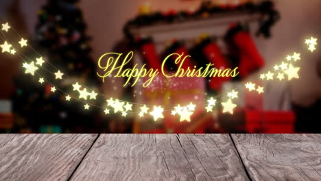 Animation-of-happy-christmas-text-banner-and-hanging-fairy-lights-against-christmas-decorated-house