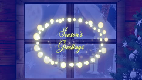 Animation-of-seasons-greetings-text-on-fairylights-banner-over-view-of-winter-landscape-from-window