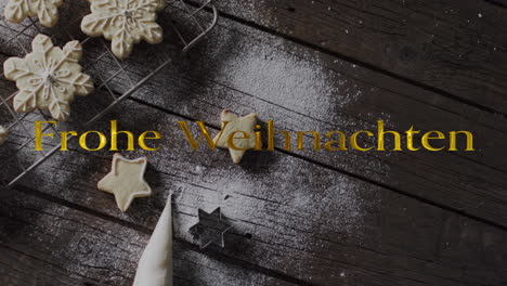 Frohe-weihnachten-text-in-gold-over-snowflake-christmas-cookies-on-dark-wood-background