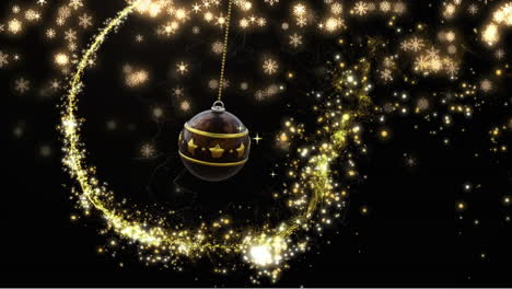 Swinging-black-and-gold-christmas-bauble,-falling-snowflakes-and-shooting-star-on-black-background
