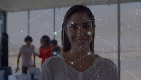Animation-of-network-of-connections-against-portrait-of-biracial-woman-smiling-at-office