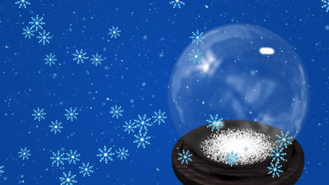 Animation-Einer-Weihnachtlichen-Schneekugel-über-Fallendem-Schnee-Auf-Blauem-Hintergrund