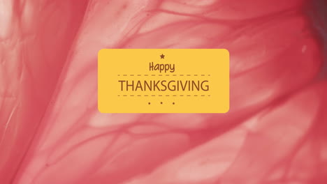 Animation-of-happy-thanksgiving-text-over-pink-leaf-background
