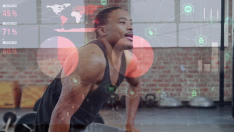 Animation-of-statistical-data-processing-over-african-american-man-working-out-with-dumbbell-at-gym