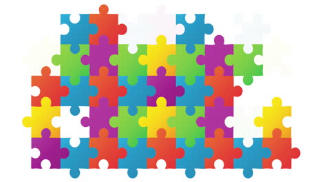 Animation-of-autism-awareness-month-puzzle-pieces-on-white-background