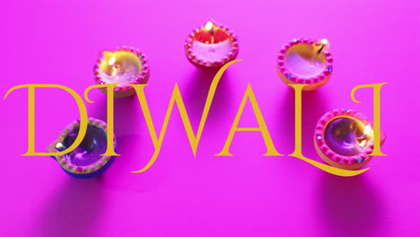 Animation-of-diwali-text-over-candles-on-purple-background