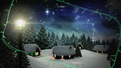 Yellow-christmas-string-lights-flashing-over-winter-village-night-scene-with-falling-snow